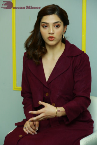 Actress Mehreen in a violet dress