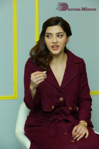 Actress Mehreen in a violet dress