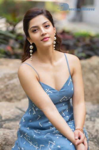 Actress Mehreen in a blue dress