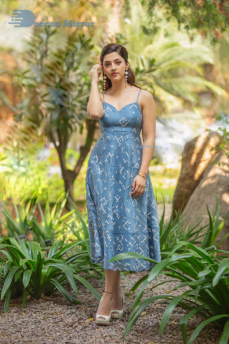 Actress Mehreen in a blue dress