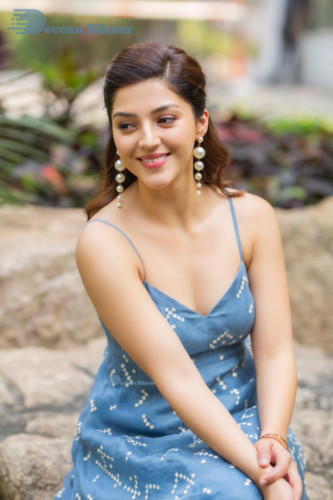 Actress Mehreen in a blue dress