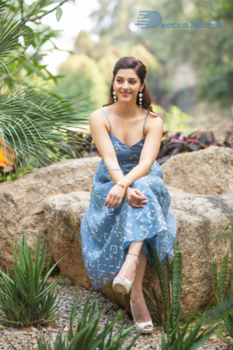 Actress Mehreen in a blue dress