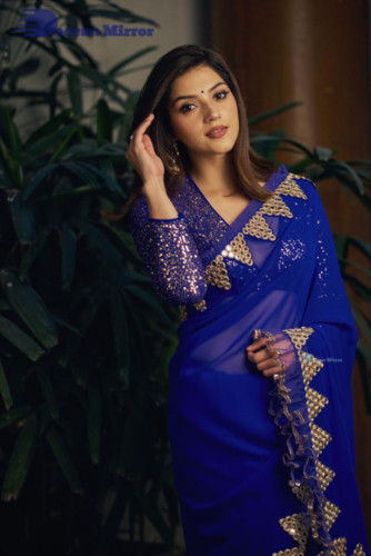 Mehreen in a dark blue saree