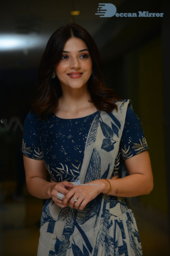 Heroine Mehreen in a blue saree