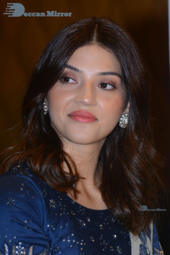 Heroine Mehreen in a blue saree