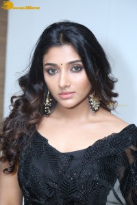 Indian Actress Mirnaa Menon in a black dress
