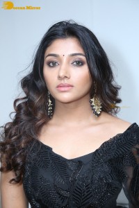 Indian Actress Mirnaa Menon in a black dress