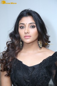 Indian Actress Mirnaa Menon in a black dress