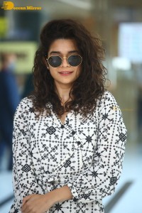 Indian actress Mithila Palkar in a black and white dress