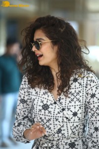 Indian actress Mithila Palkar in a black and white dress