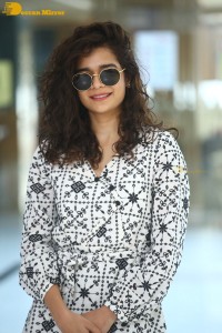 Indian actress Mithila Palkar in a black and white dress