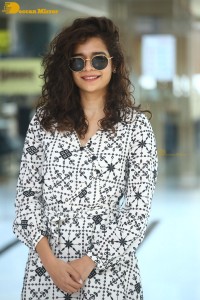 Indian actress Mithila Palkar in a black and white dress