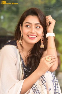 Telugu Film Actress Mokksha in a black salwar kameez dress