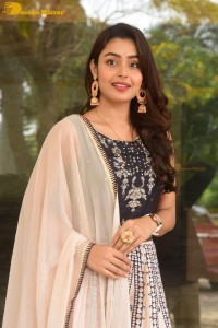 Telugu Film Actress Mokksha in a black salwar kameez dress