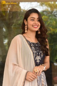 Telugu Film Actress Mokksha in a black salwar kameez dress