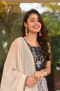 Telugu Film Actress Mokksha in a black salwar kameez dress