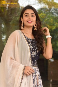Telugu Film Actress Mokksha in a black salwar kameez dress