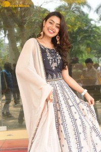 Telugu Film Actress Mokksha in a black salwar kameez dress