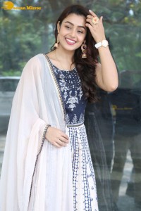 Telugu Film Actress Mokksha in a black salwar kameez dress