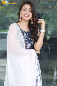 Telugu Film Actress Mokksha in a black salwar kameez dress