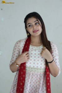 actress moksha cute in a white salwar dress