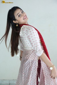 actress moksha cute in a white salwar dress