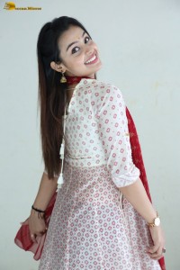 actress moksha cute in a white salwar dress