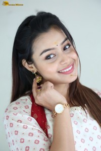 actress moksha cute in a white salwar dress