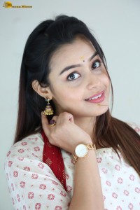 actress moksha cute in a white salwar dress