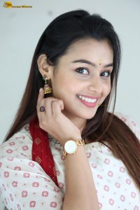 actress moksha cute in a white salwar dress