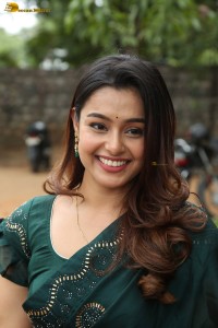 actress Mokksha cute in a green saree