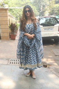 Actress Mouni Roy in a salwar dress and sun glasses