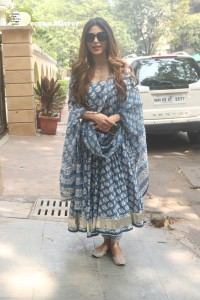 Actress Mouni Roy in a salwar dress and sun glasses