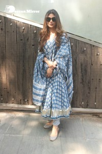 Actress Mouni Roy in a salwar dress and sun glasses