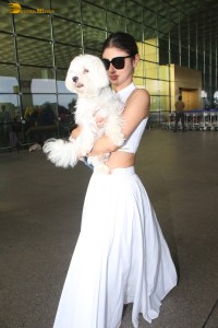 Indian actress Mouni Roy spotted with her cute dog at mumbai airport