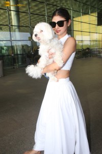 Indian actress Mouni Roy spotted with her cute dog at mumbai airport