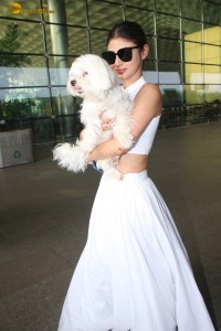 Indian actress Mouni Roy spotted with her cute dog at mumbai airport