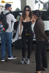 actress Mouni Roy in a black top at mumbai airport