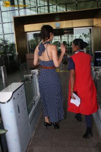 bollywood actress mouni roy in a shoulderless dress at airport