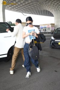 actress mouni roy pretty in a white t-shirt at airport