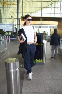 actress mouni roy pretty in a white t-shirt at airport