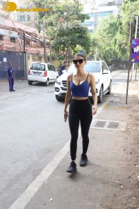 Mouni Roy looks hot in a blue top and black jeans
