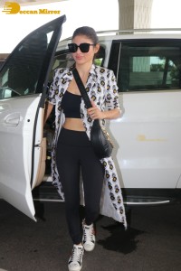 Mouni Roy dressed in black and white at the Airport