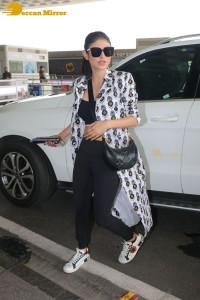 Mouni Roy dressed in black and white at the Airport