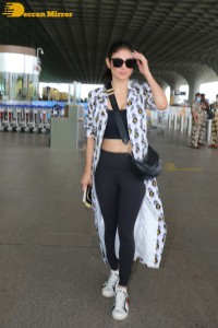 Mouni Roy dressed in black and white at the Airport