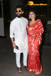 Newlyweds Mouni Roy and Suraj Nambiar at Mumbai Airport