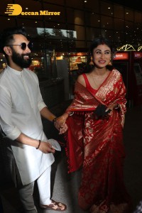 Newlyweds Mouni Roy and Suraj Nambiar at Mumbai Airport