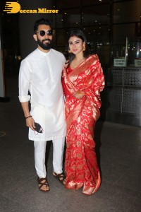 Newlyweds Mouni Roy and Suraj Nambiar at Mumbai Airport