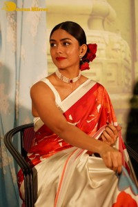 Mrunal Thakur attending a movie function dressed in a saree