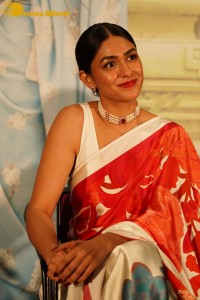 Mrunal Thakur attending a movie function dressed in a saree